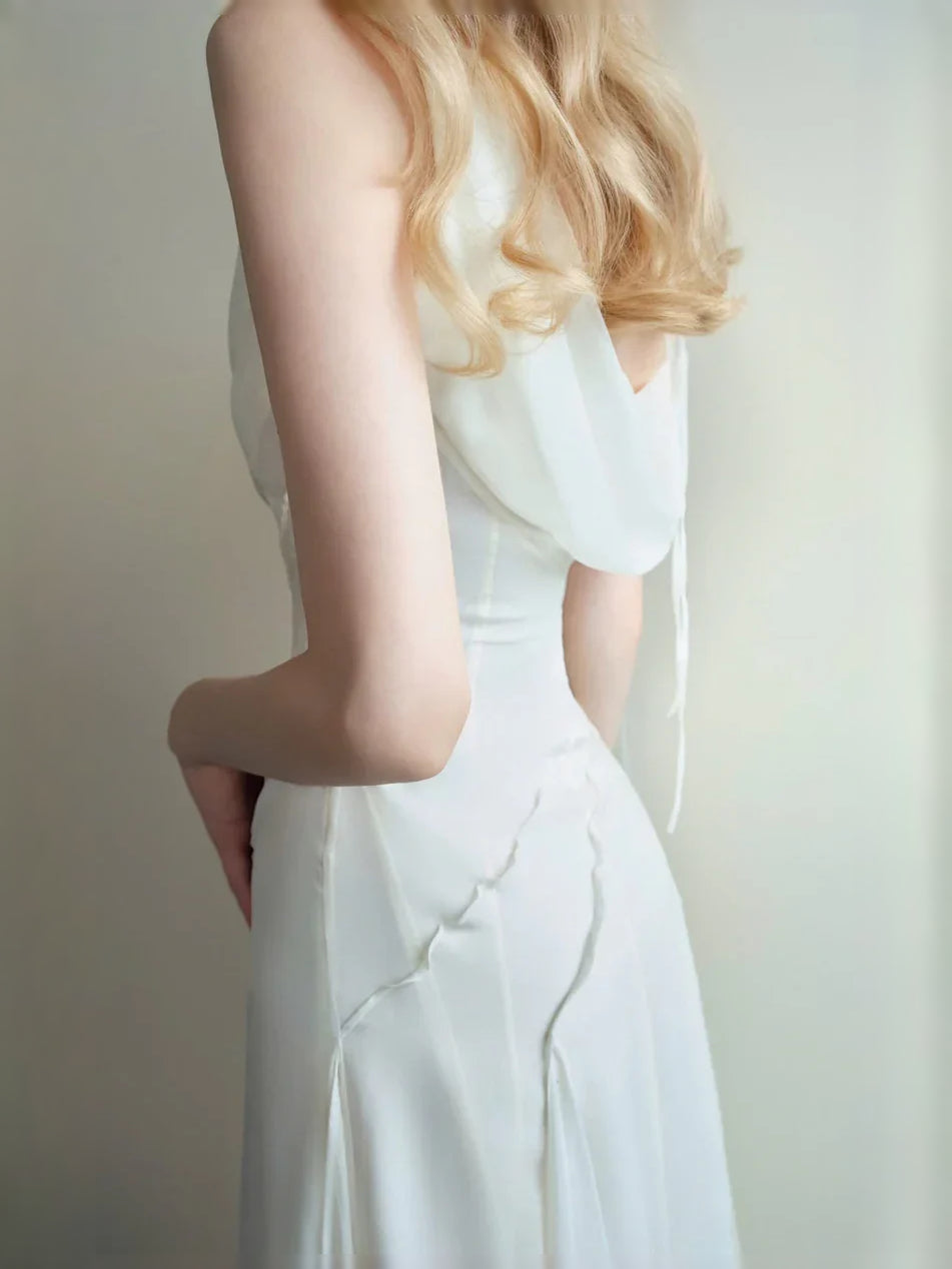 Ivory cowl-neck chiffon dress with draped bodice and slim fitted waist
