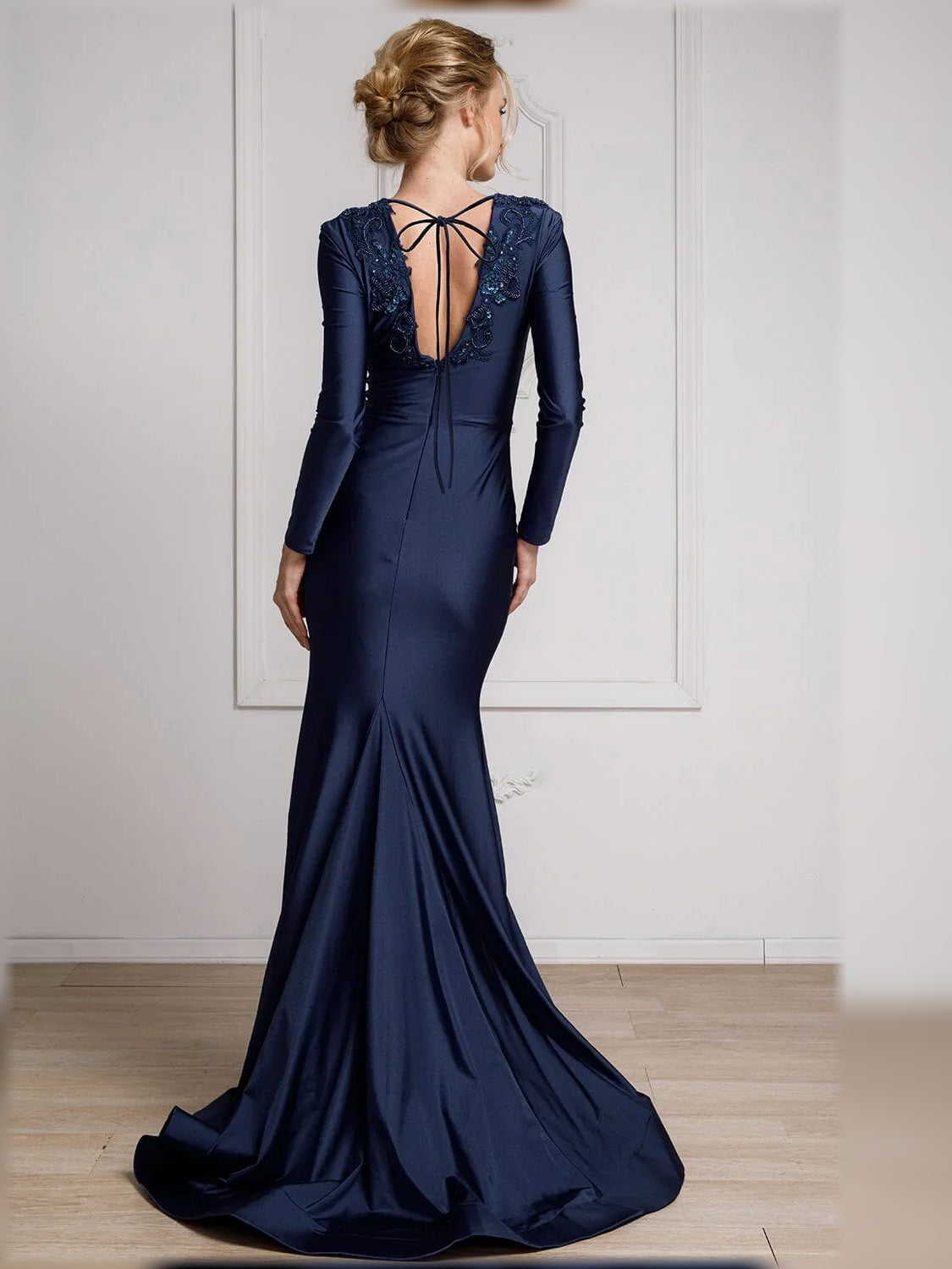 Navy blue V-neck floor-length formal dress with long sleeves and back lace-up beading.