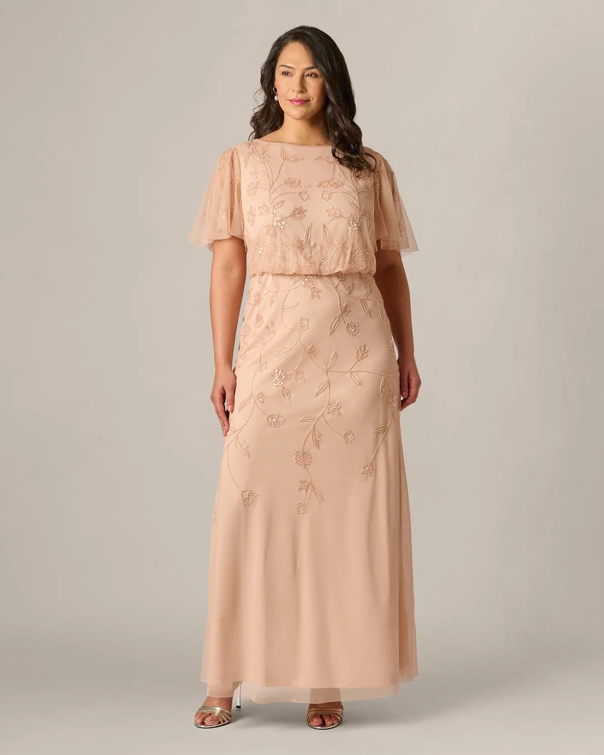 Blush pink A-line maxi dress with flutter sleeves and embellished floral bodice