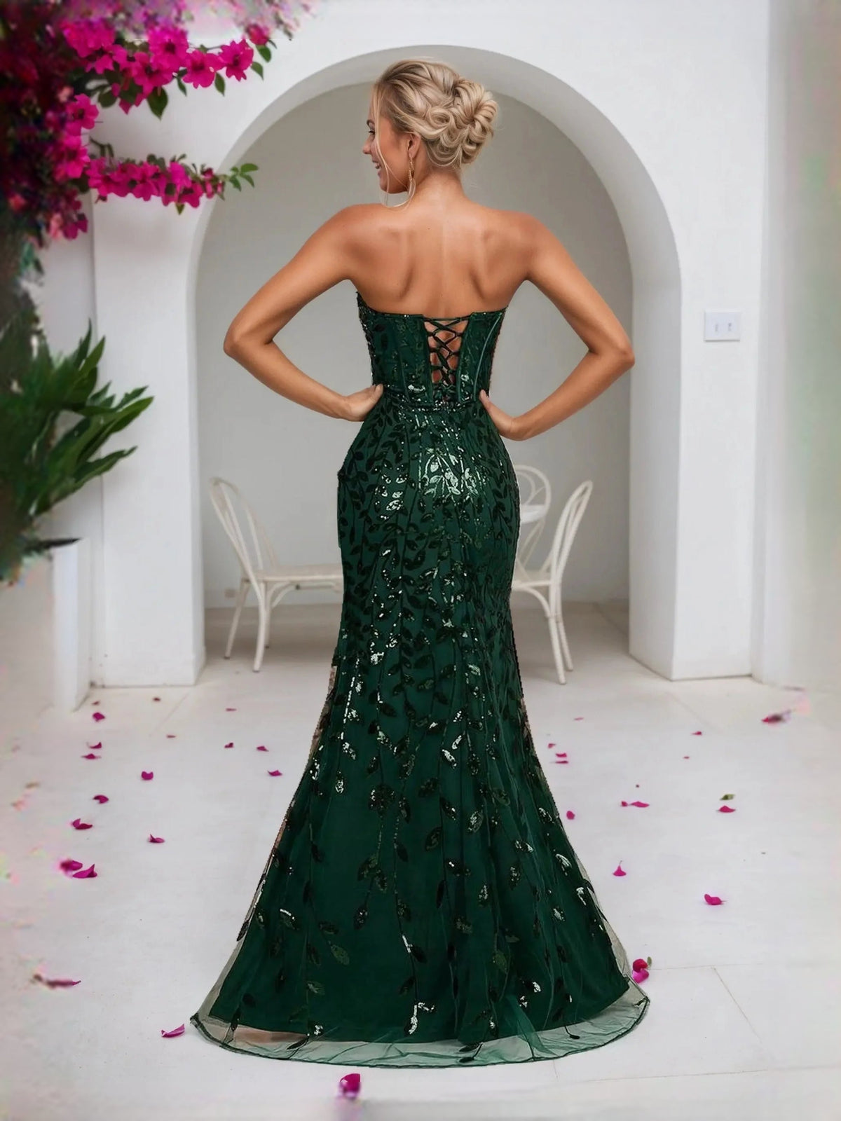 Back view emerald green corset mermaid prom dress with openwork lacing and rear slit