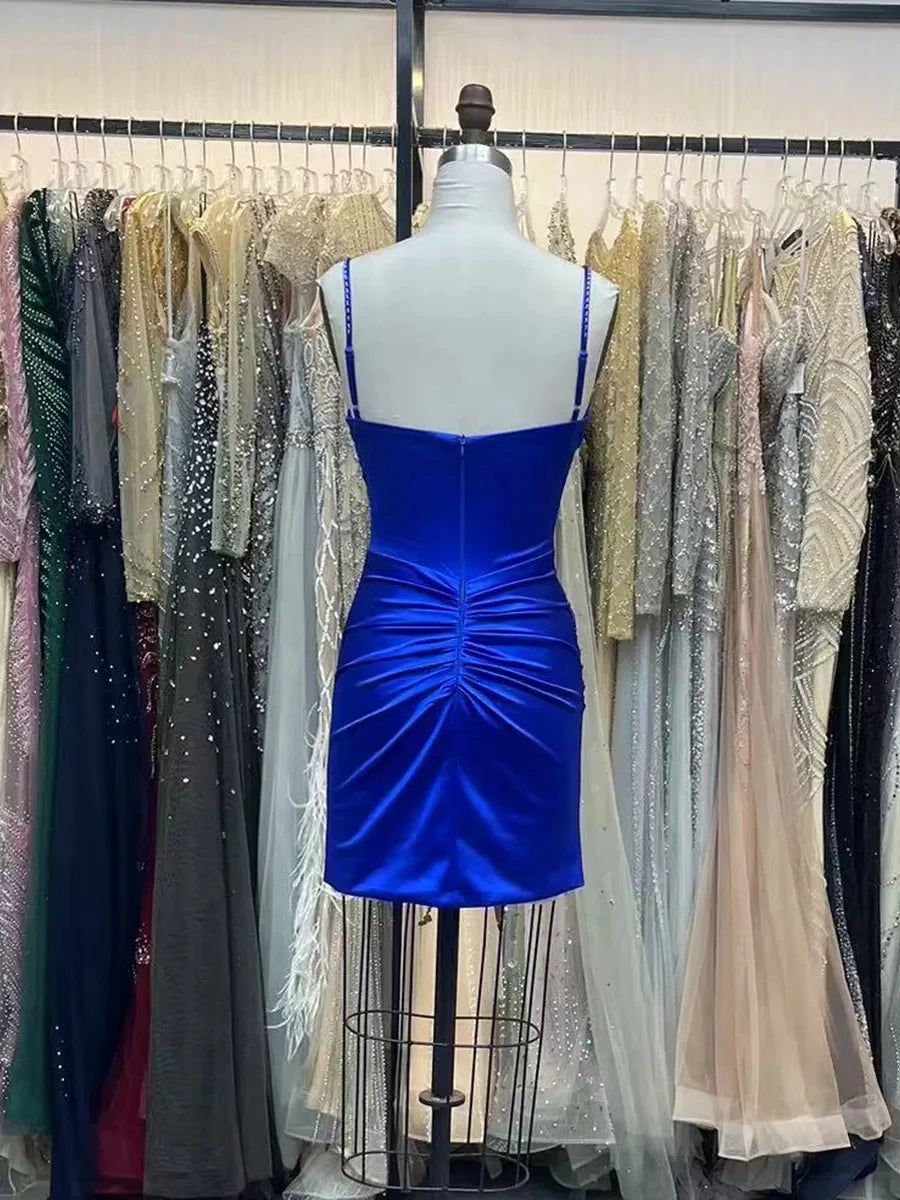 Blue satin ruched mini dress on mannequin, corset V-neck and sparkle trim