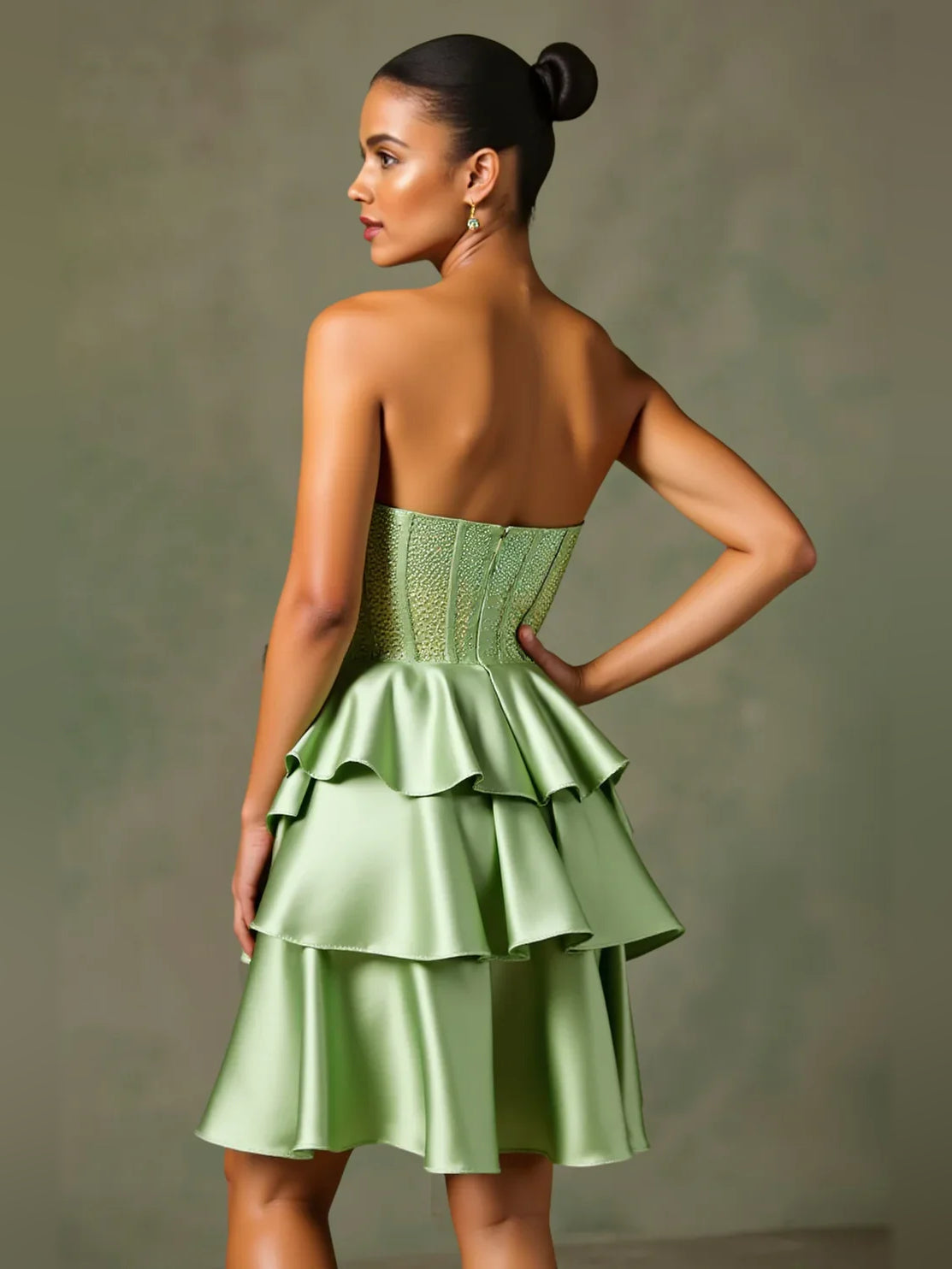 Dusty sage open-back strapless corset dress with tiered ruffle skirt