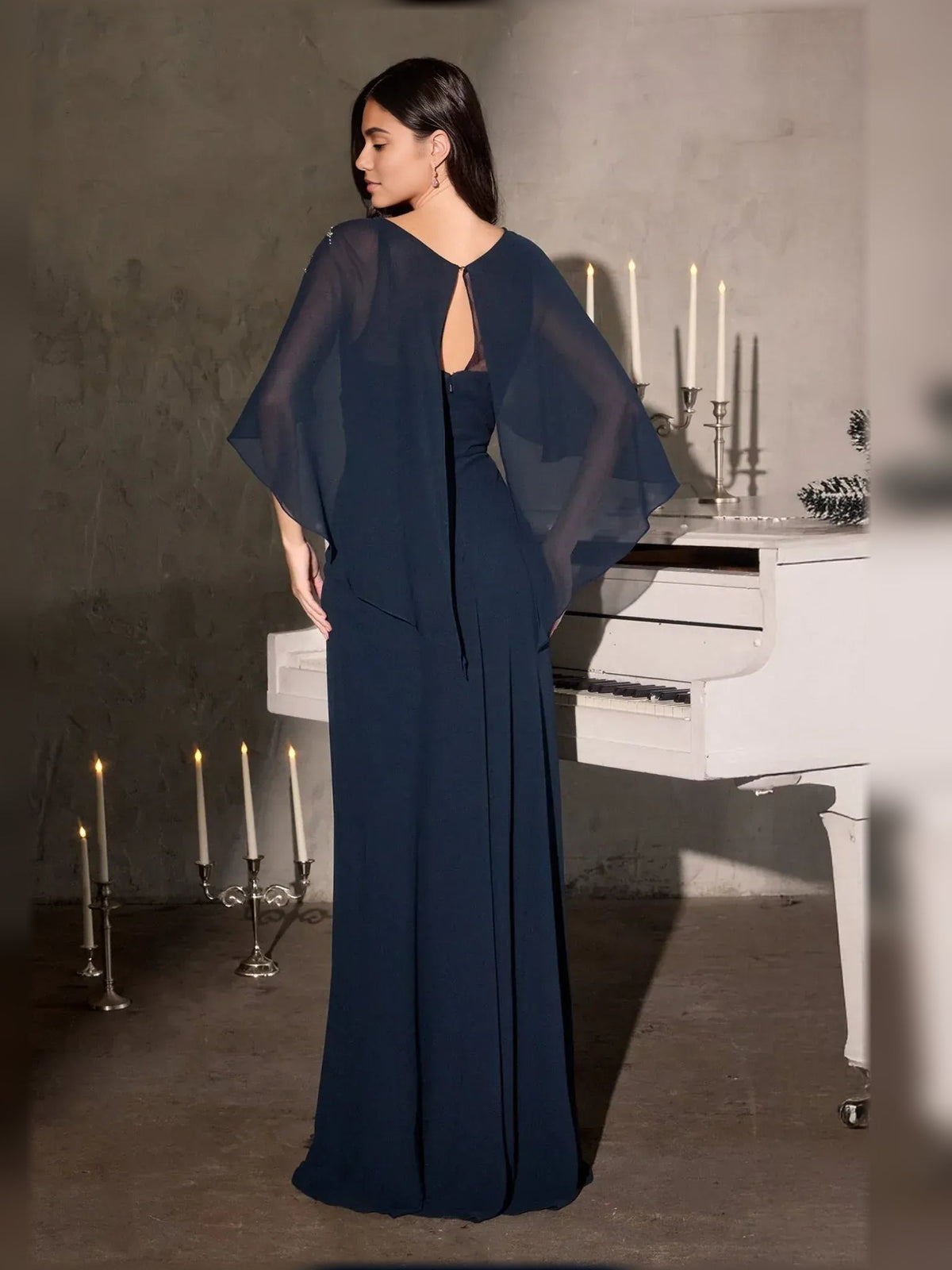 Navy chiffon scoop-neck gown with open back and flowing sheer sleeves