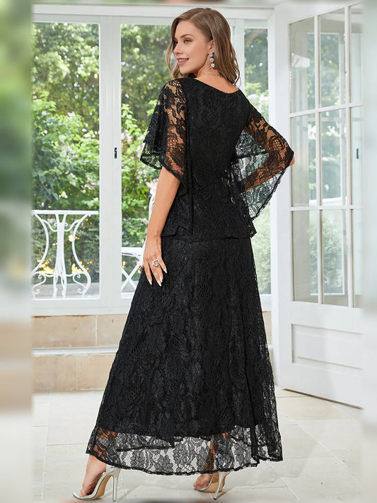 Black lace A-line formal dress, back view with short flutter sleeves, full-length skirt