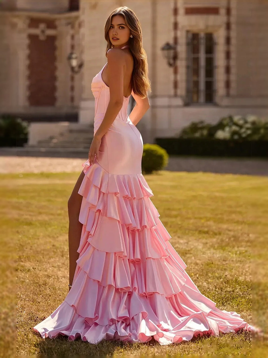 Blush pink halter corset satin dress with ruffled tiered mermaid skirt and side slit
