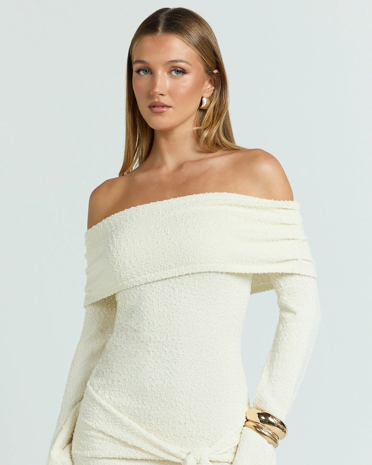 Cream knitted off-shoulder mini dress with ruched top band and waist tie detail