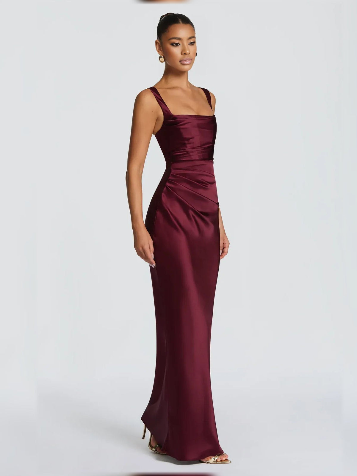 Burgundy square-neck corset formal dress with ruched detailing and floor-length hem