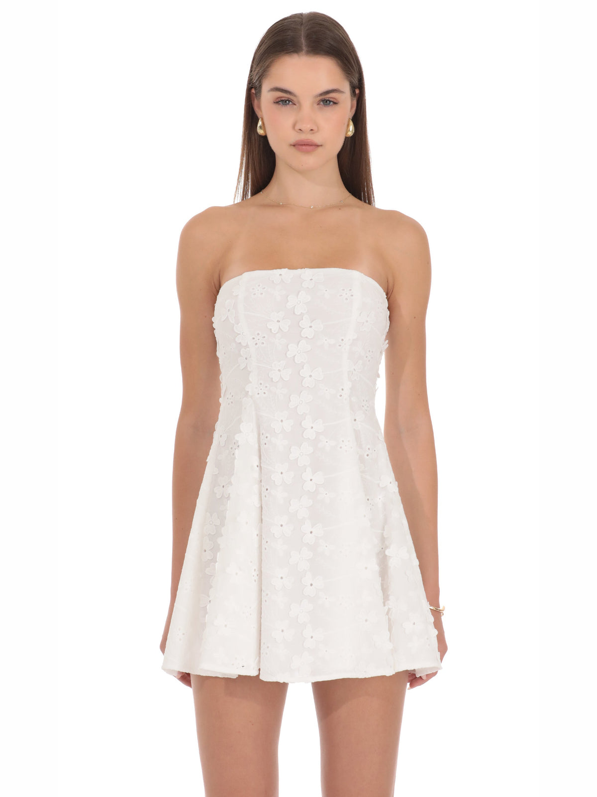 White homecoming dress with structured woven fabric construction and mini hem