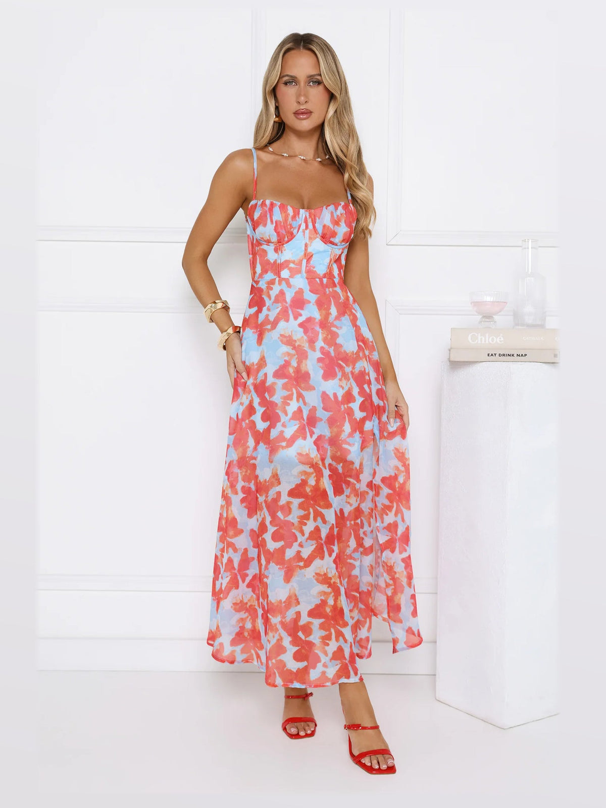 Blue formal dress with structured woven fabric construction and maxi hem