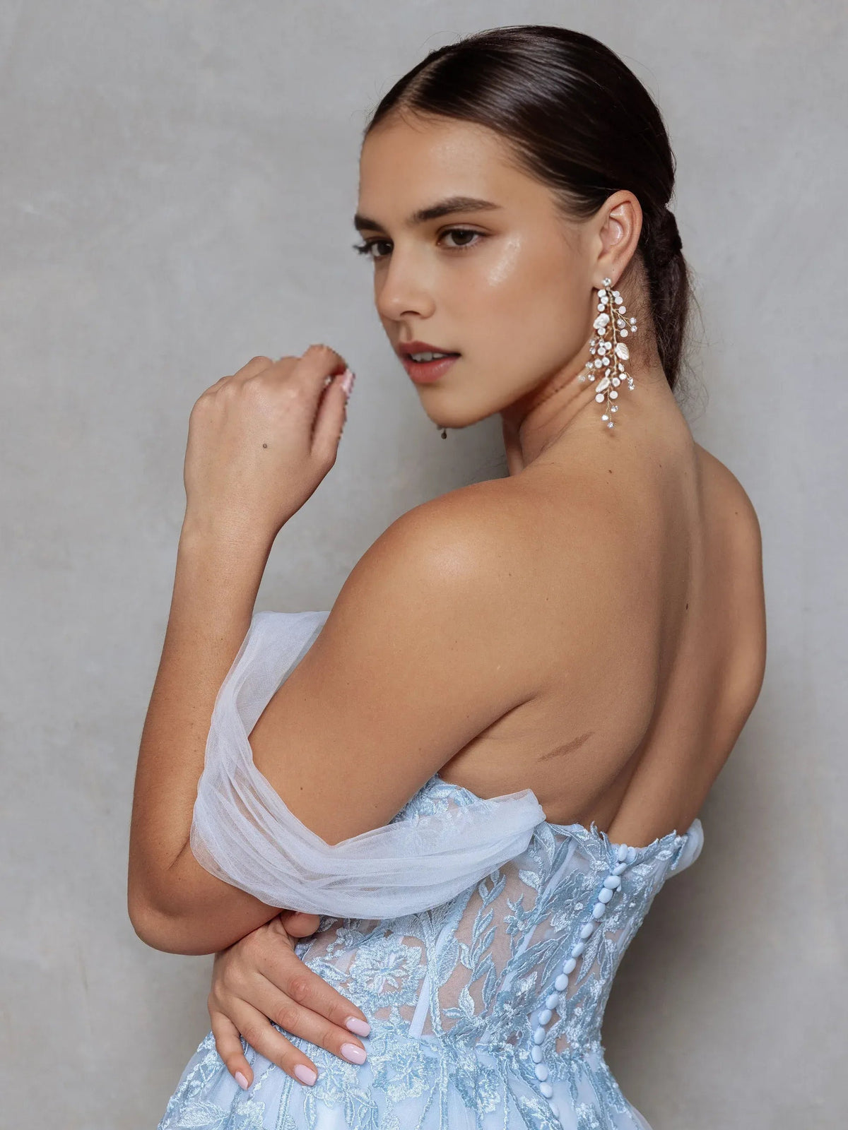 Sky blue floral off-the-shoulder maxi dress with embroidered bodice, draped sleeve detail