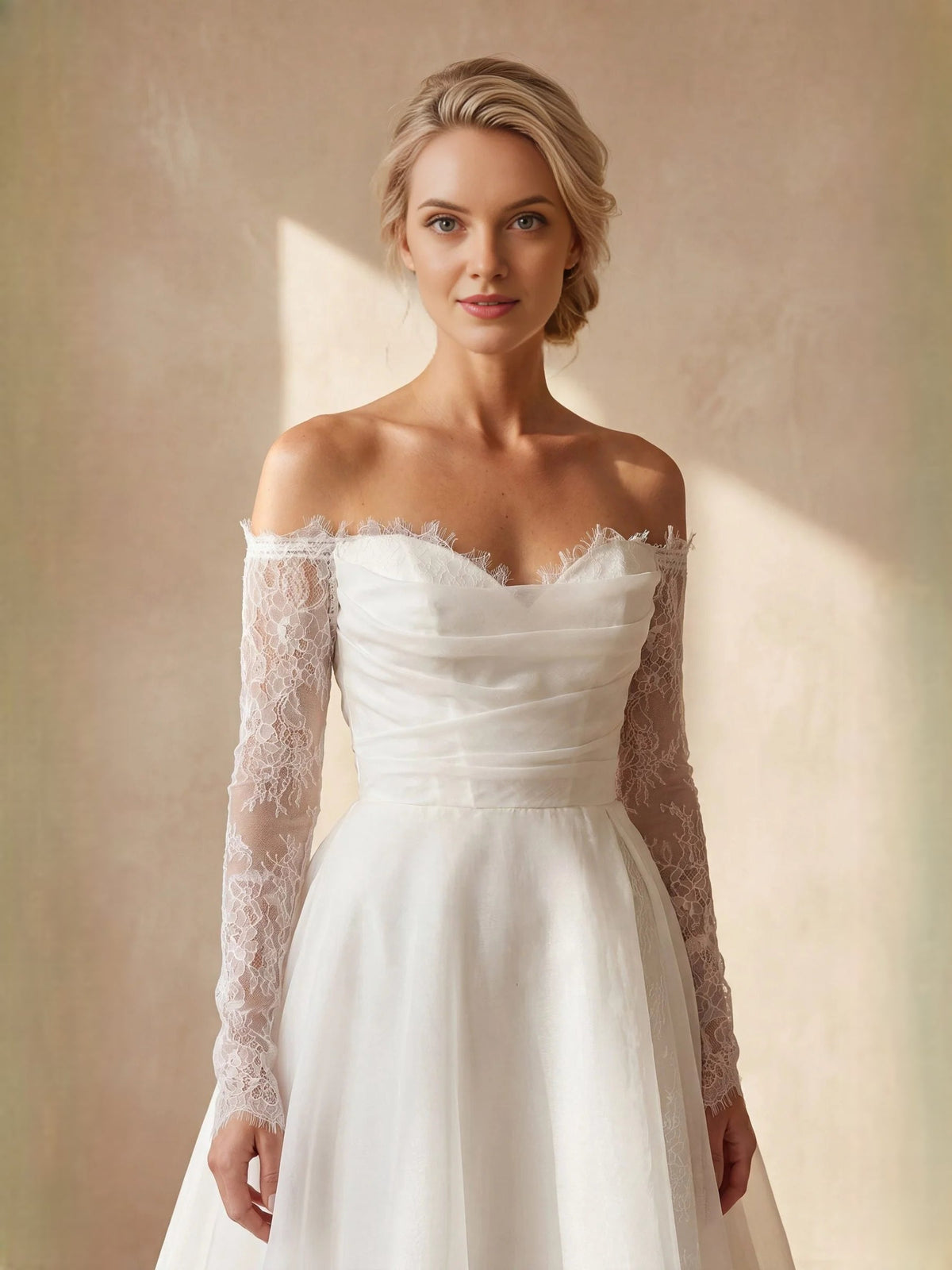 Ivory sweetheart neckline wedding dress with ruched bodice and lace off-shoulder sleeves