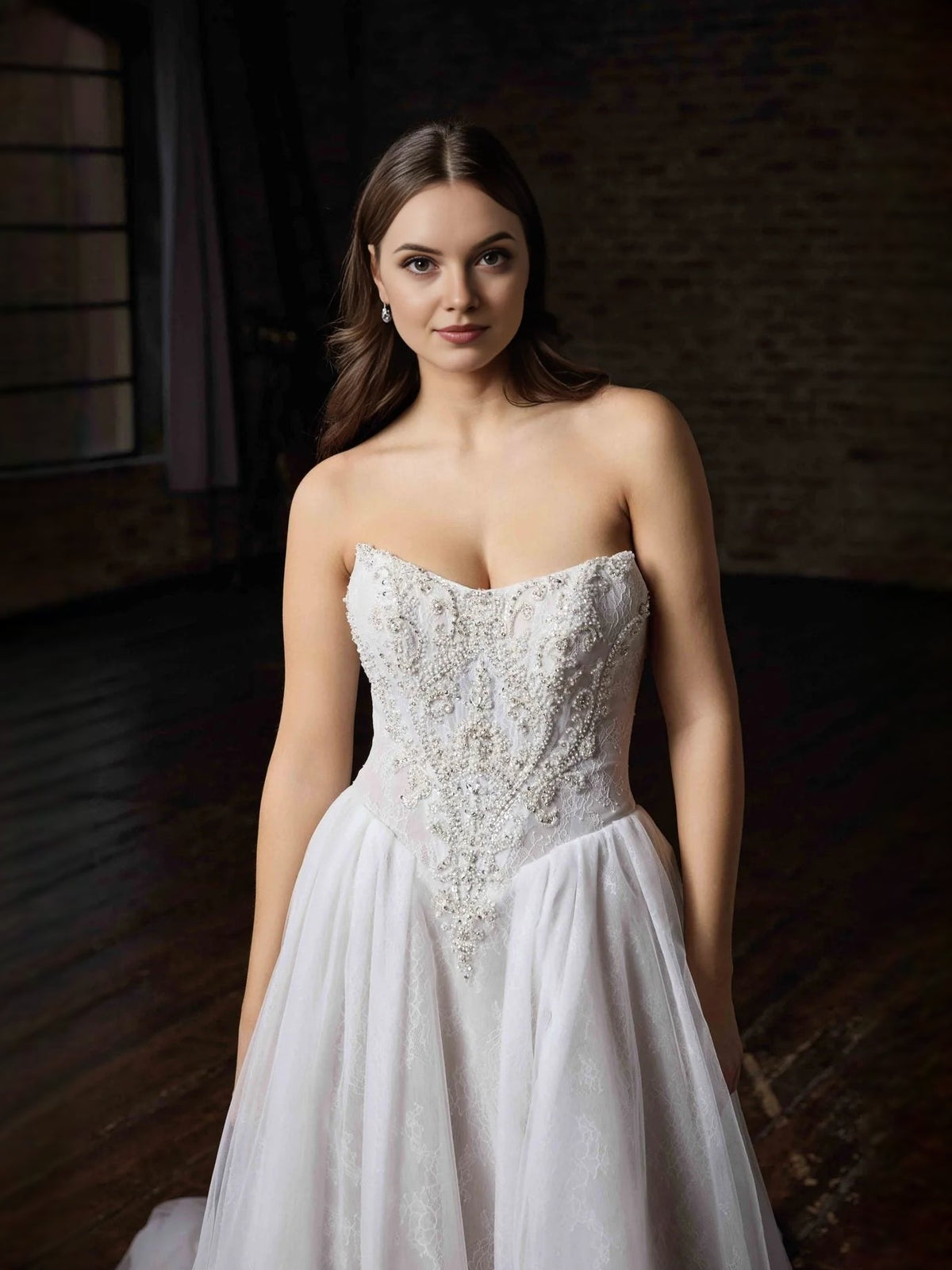 Ivory tulle wedding dress with beaded sweetheart corset bodice, front close-up
