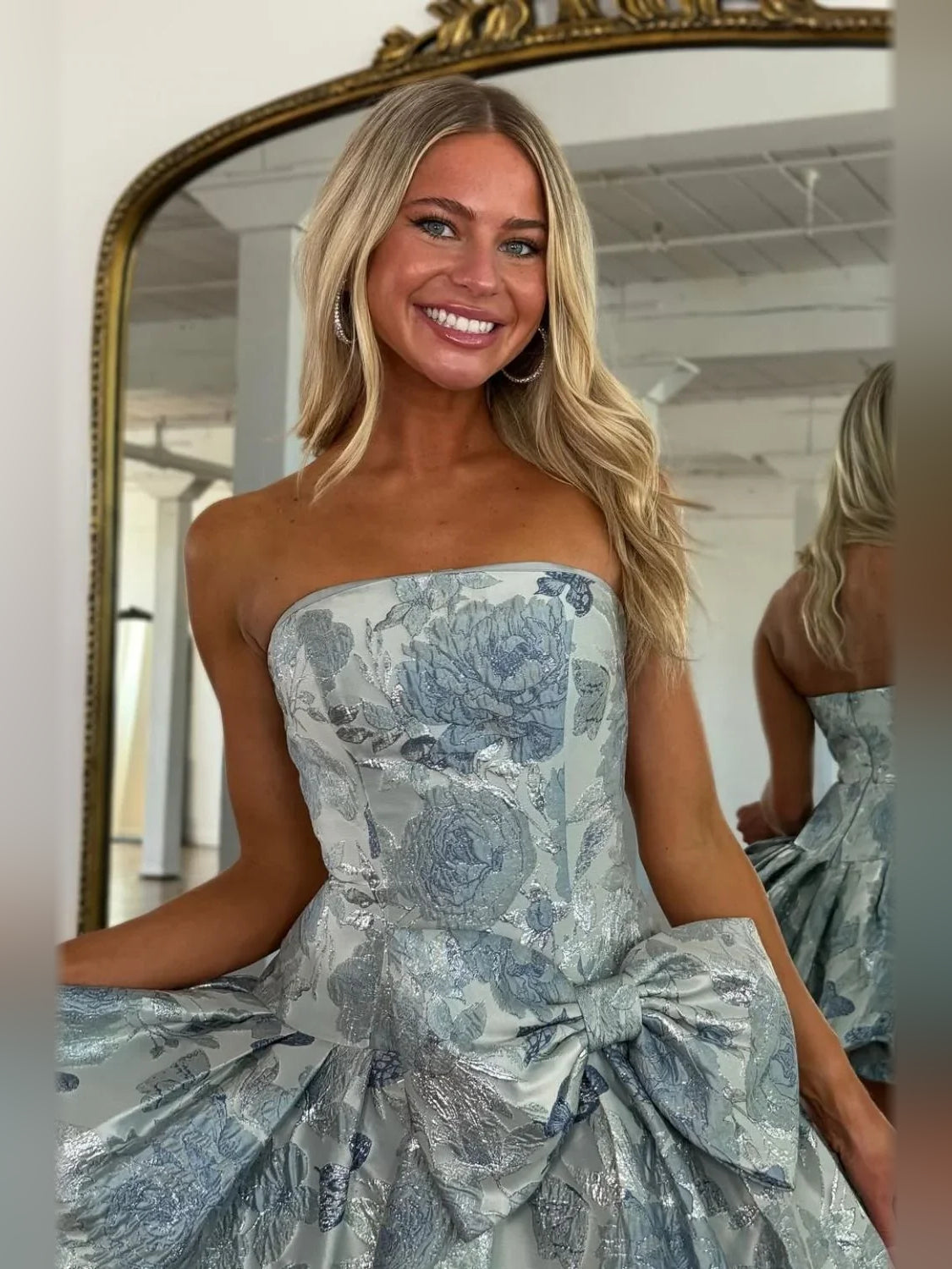 Strapless bodice mini A-line dress with blue floral print and large front bow