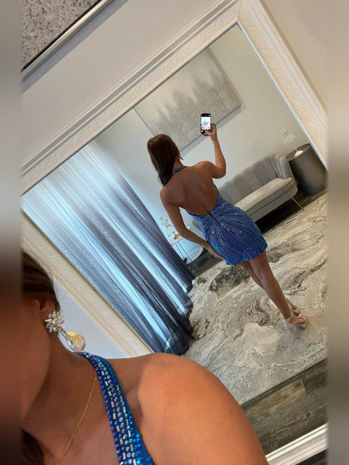 Cobalt blue beaded bodycon mini dress with V-neck and open-back straps
