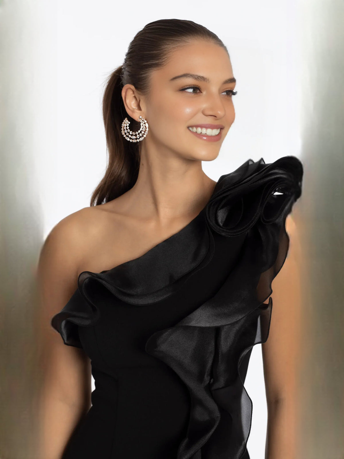 Black one-shoulder ruffle dress with layered shoulder drape detail
