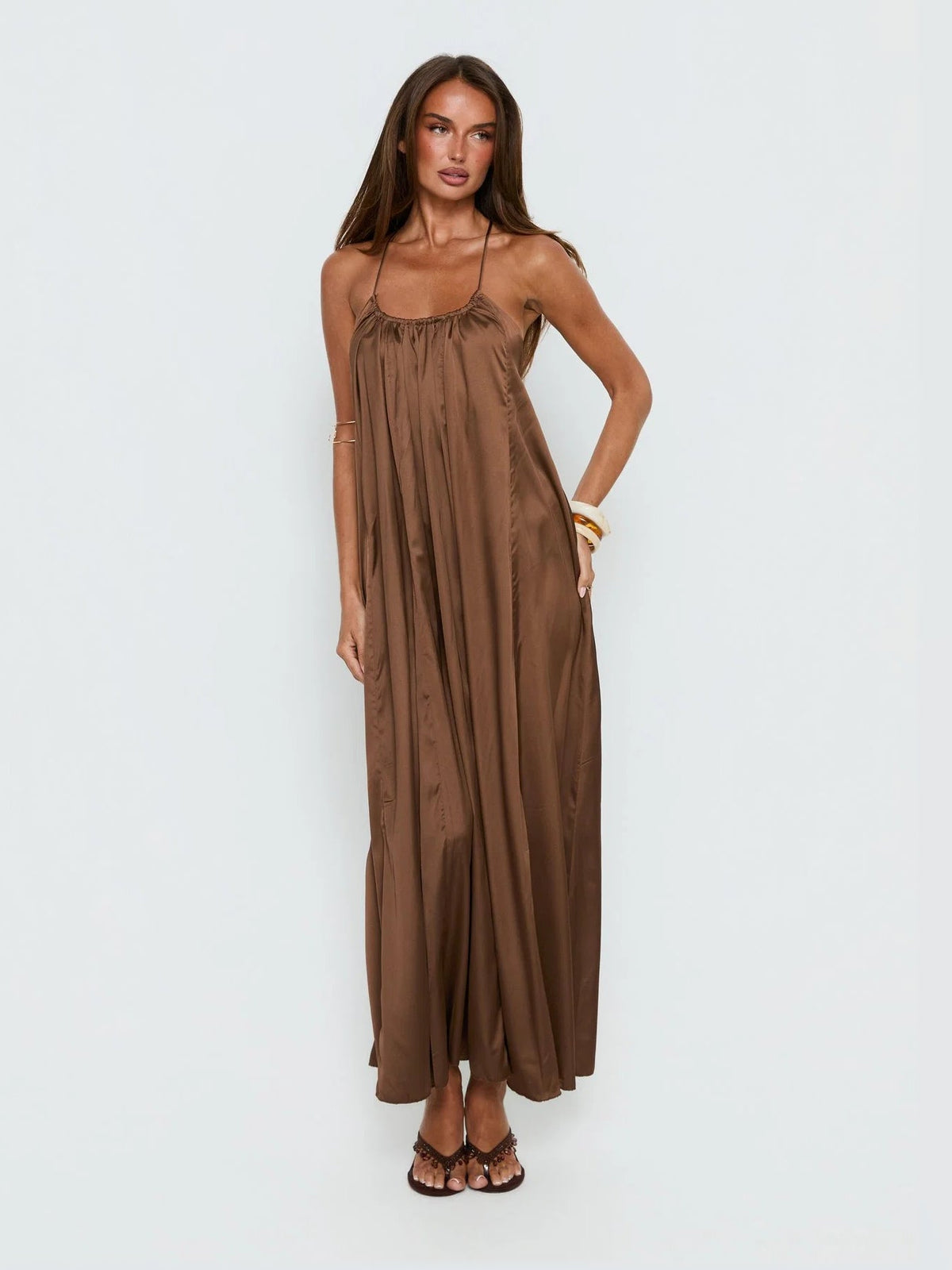Chocolate formal dress with structured woven fabric construction and maxi hem