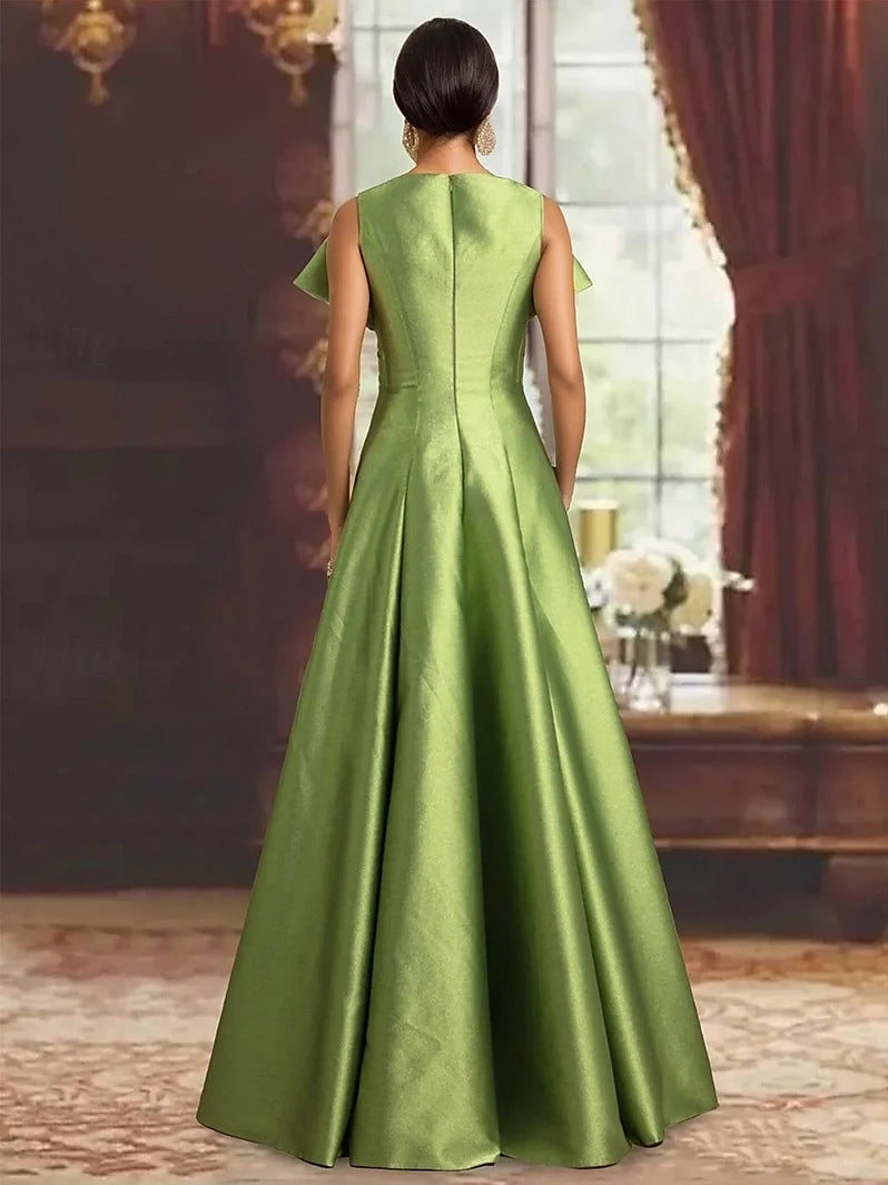 Green satin A-line prom dress with V-neck back, viewed from behind