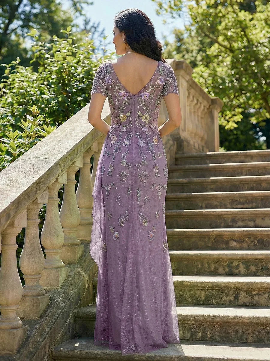 Light purple chiffon mermaid dress viewed from the back with V-back and floral appliques