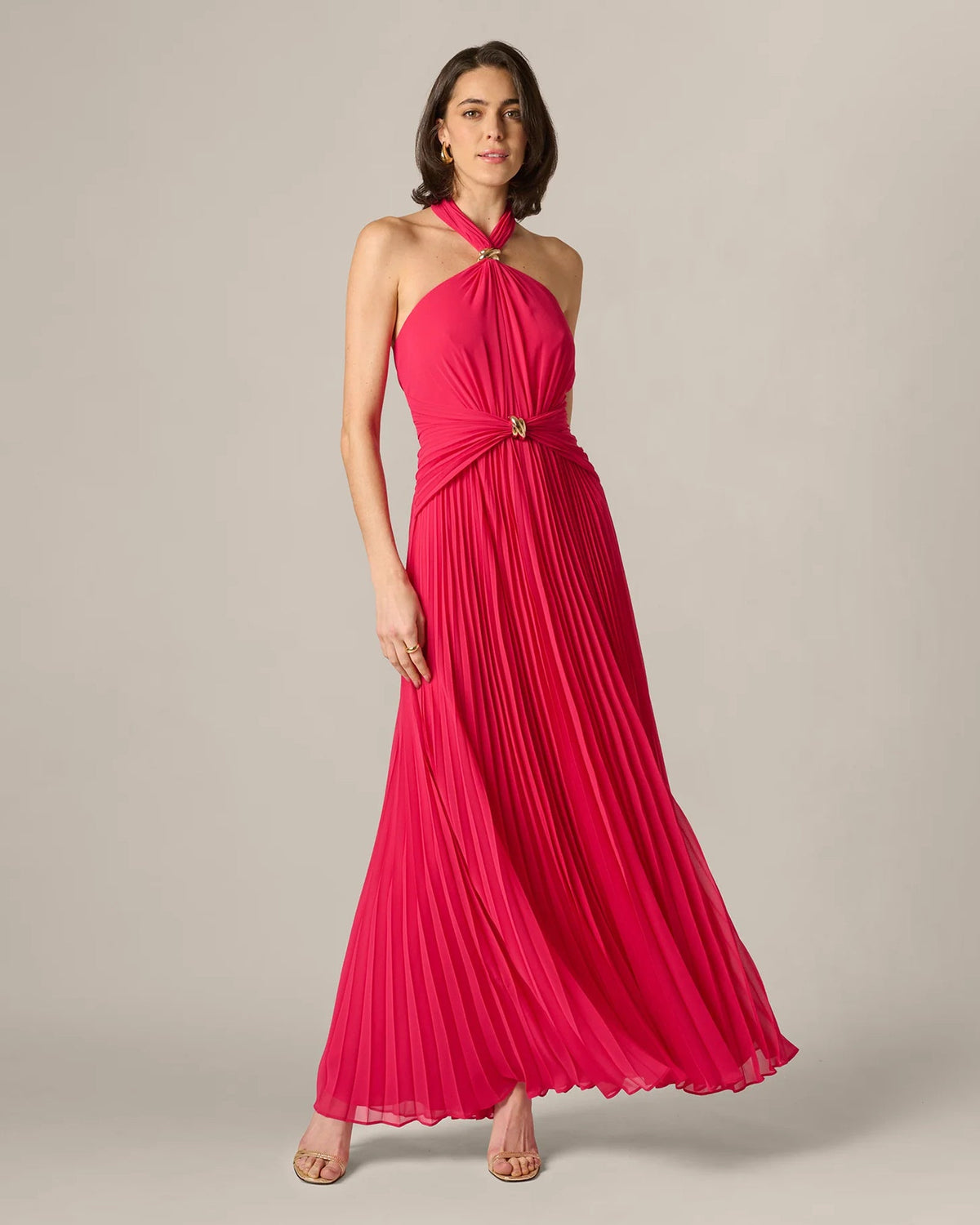 Cherry red halter maxi dress with pleated skirt and twisted chest detail