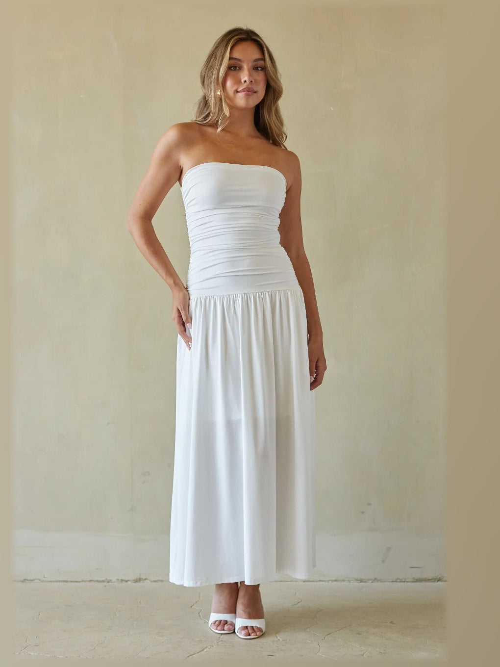 Navy formal dress with structured woven fabric construction and maxi hem
