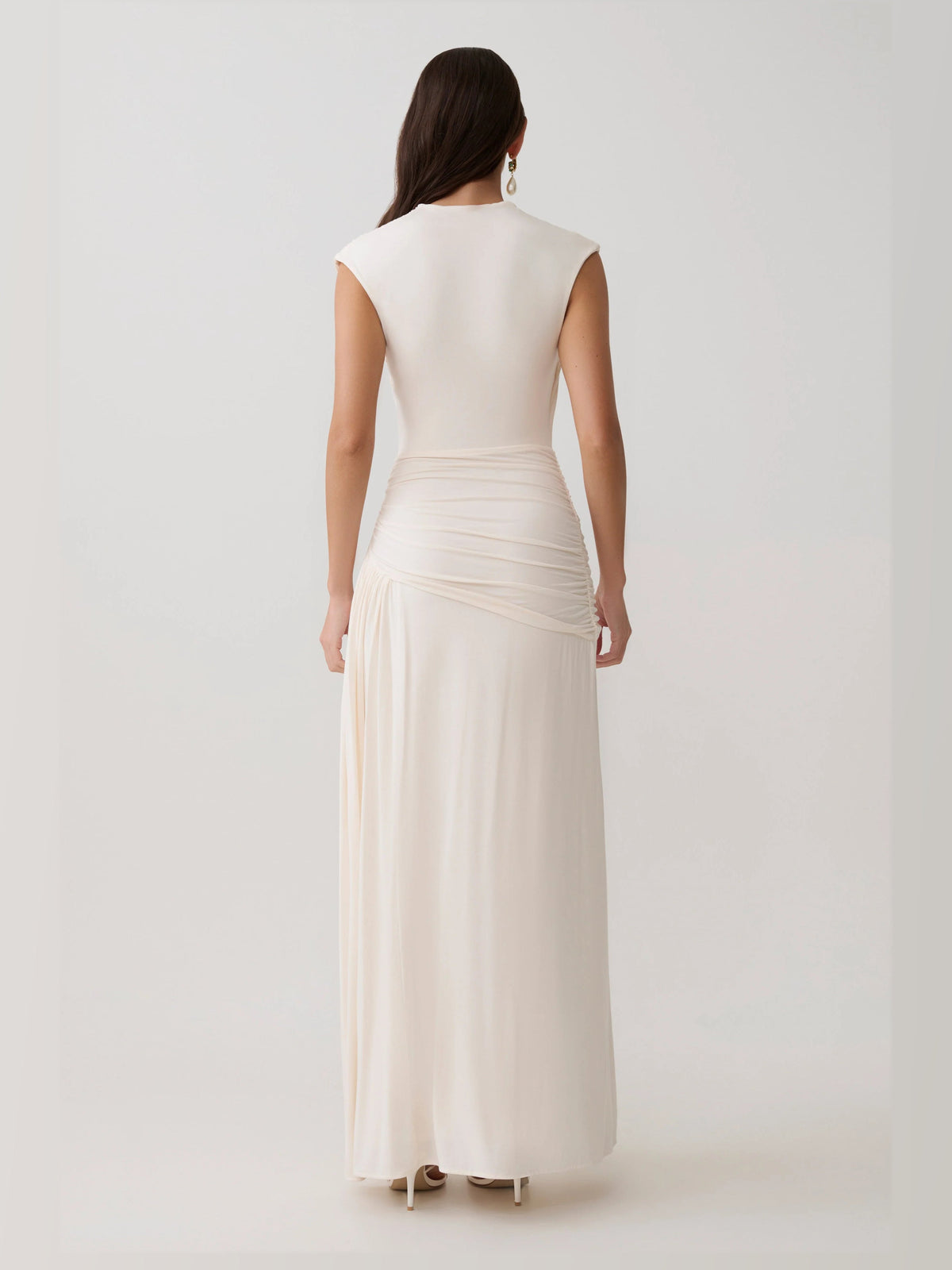 Ivory formal dress with structured woven fabric construction and maxi hem