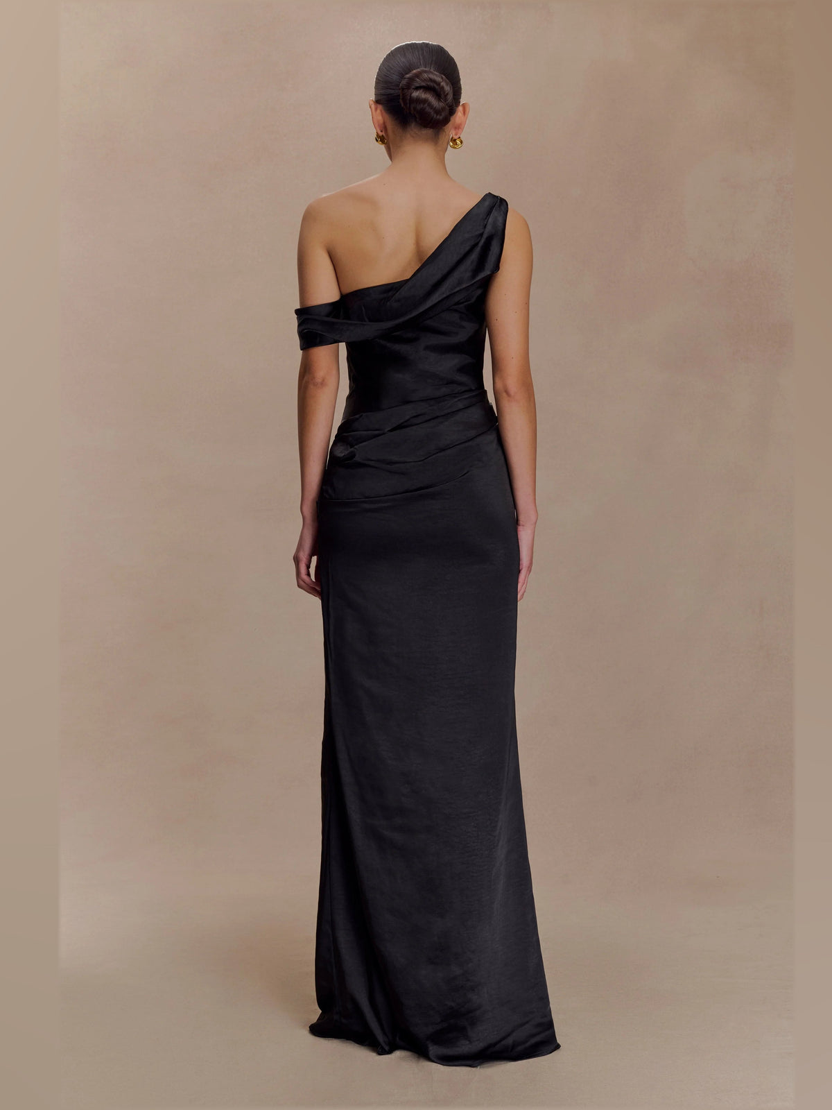 Black formal dress with satin construction and maxi hem