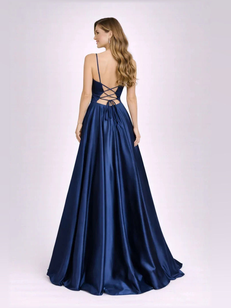 Navy blue open-back formal gown, crisscross back straps, flowing A-line skirt
