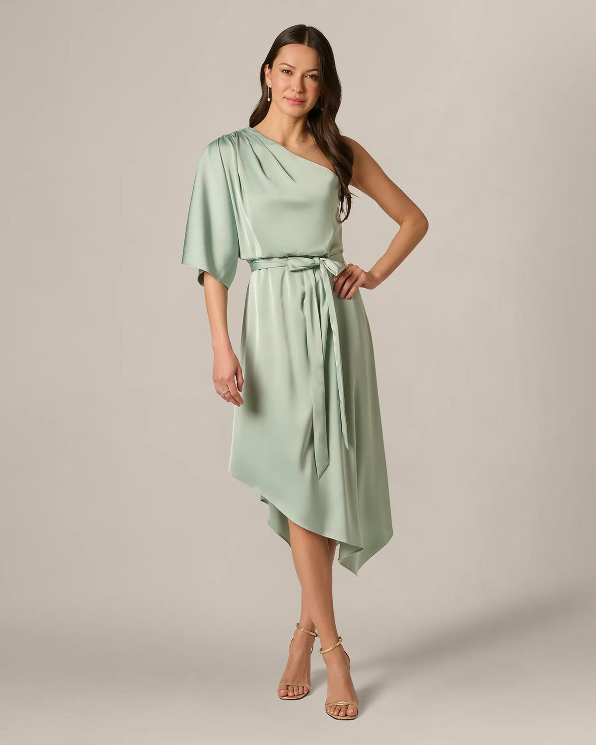 Mint green draped one-shoulder midi dress with tie waist and flowy asymmetric skirt
