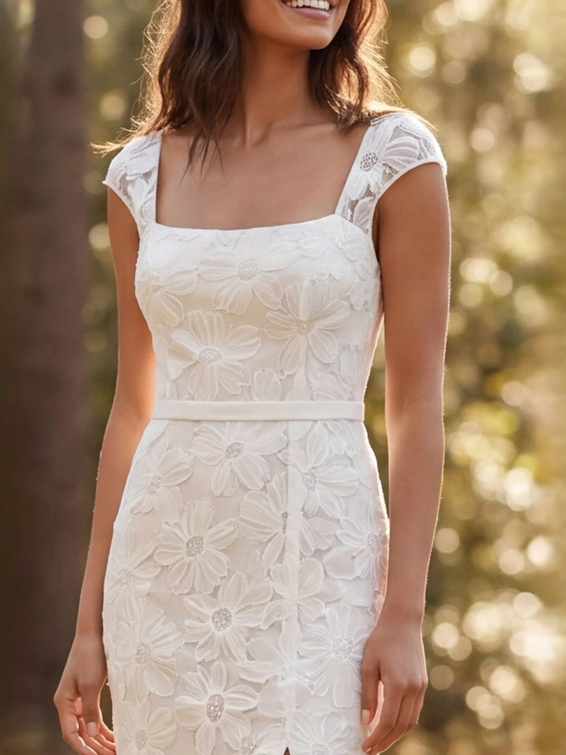 Ivory floral appliqué wedding dress with square neck, cap sleeves, and fitted silhouette