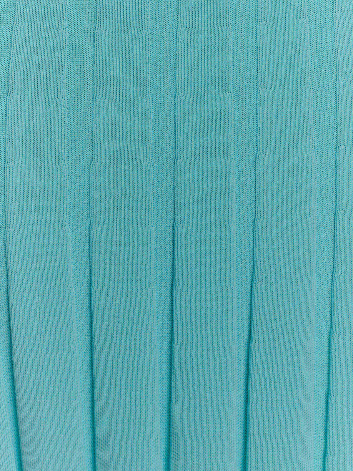 Turquoise knit fabric with vertical ribbing texture