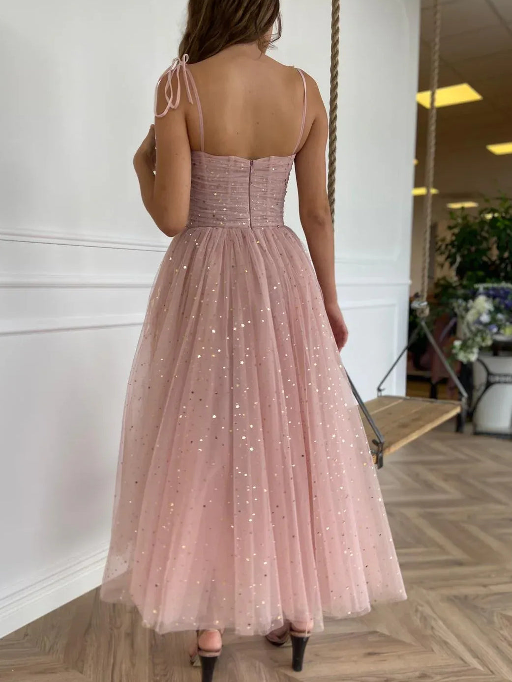 Dusty pink tulle prom dress, open-back with tied spaghetti straps, A-line midi skirt
