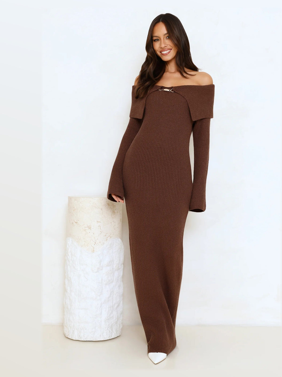 Brown formal dress with structured woven fabric construction and maxi hem