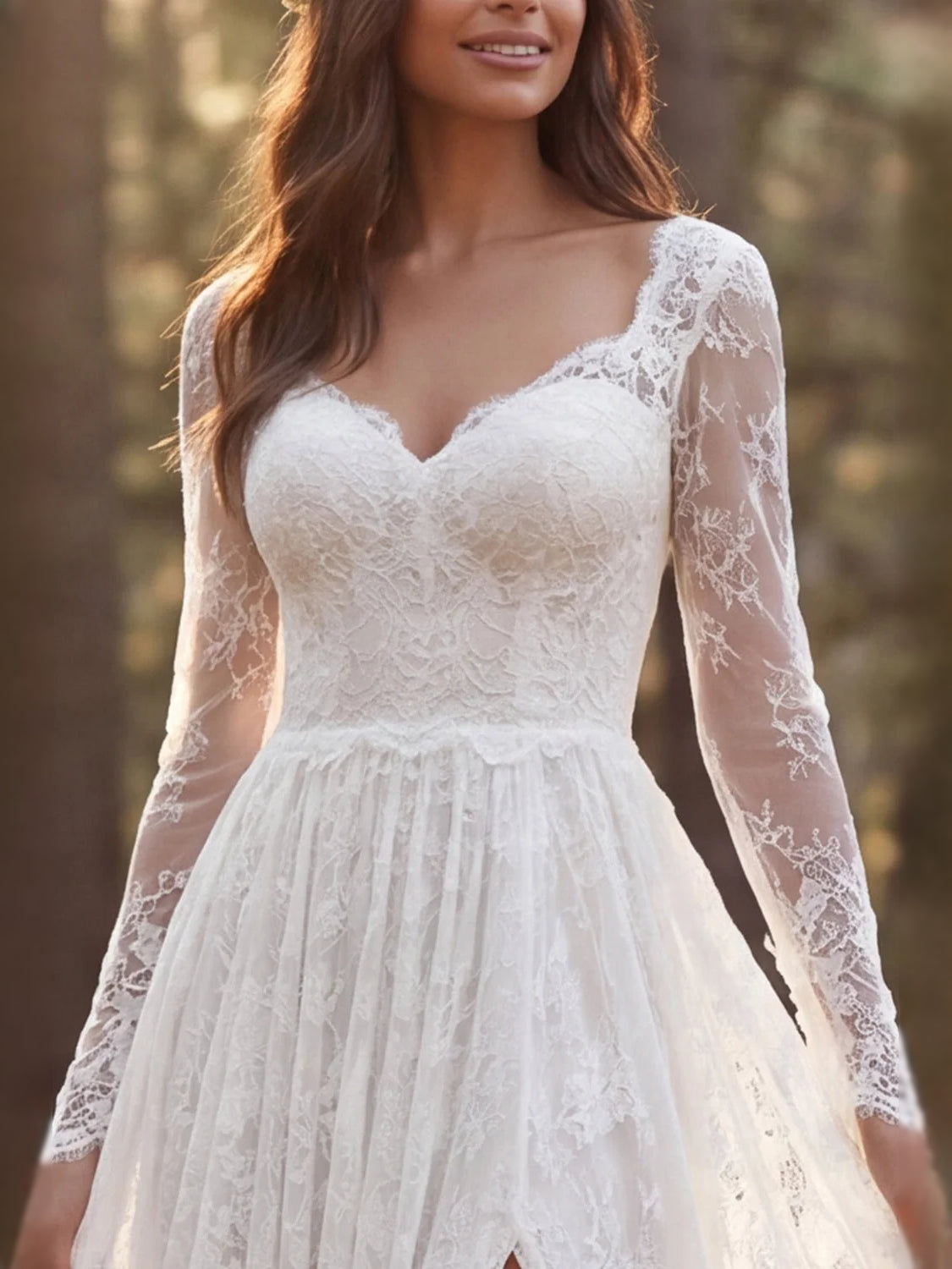 Ivory lace V-neck wedding dress with textured bodice and sheer long sleeves