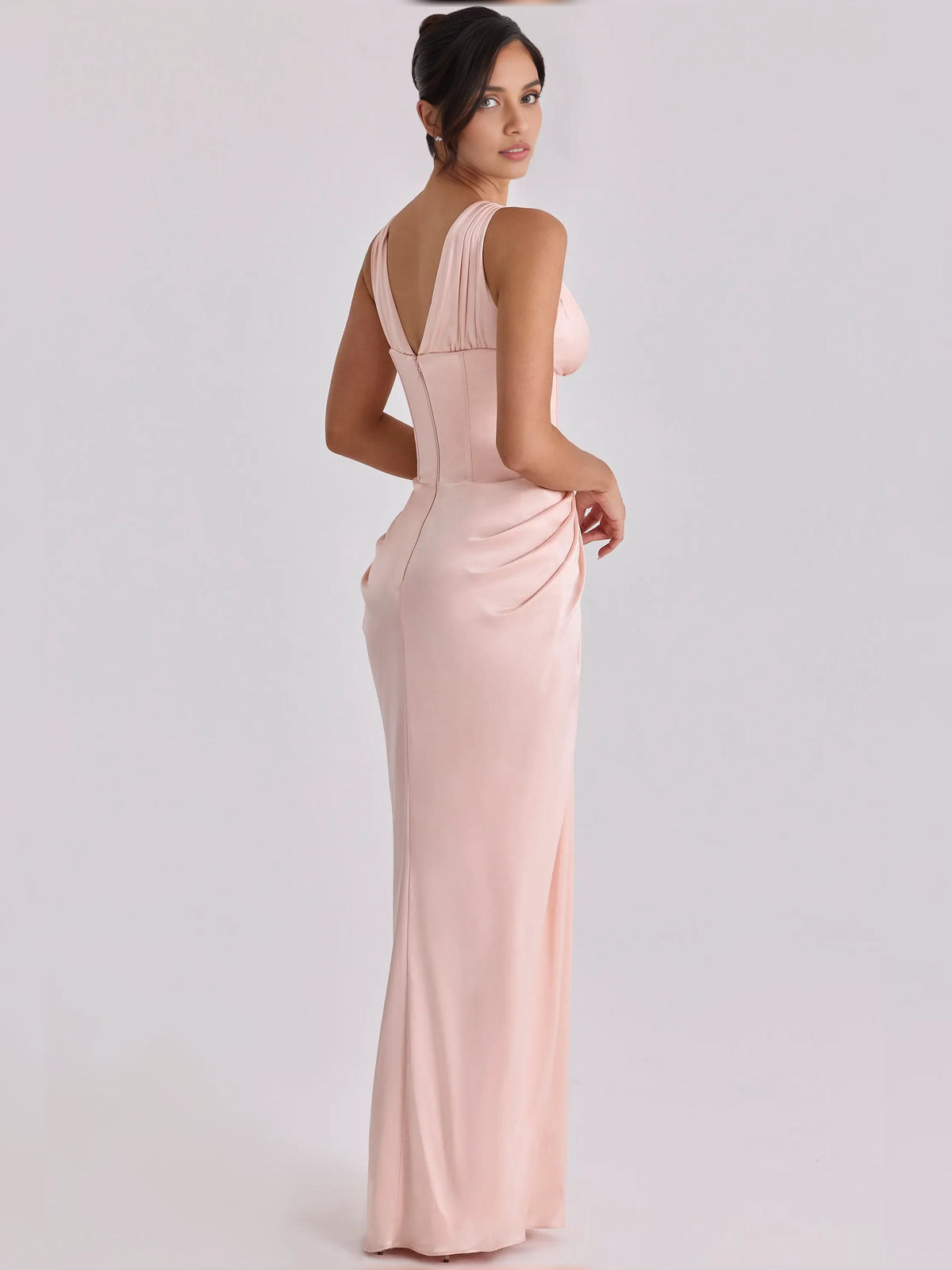 Blush pink v-neck corset pleated floor-length formal dress, side view, maxi length