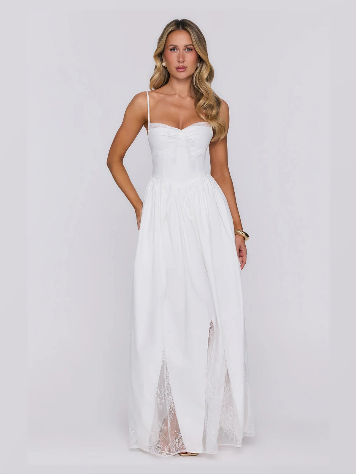 White formal dress with structured woven fabric construction and maxi hem