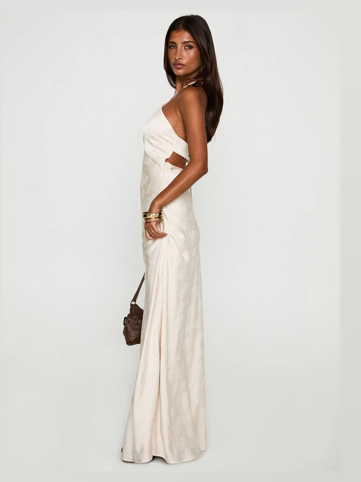 Champagne formal dress with structured woven fabric construction and maxi hem