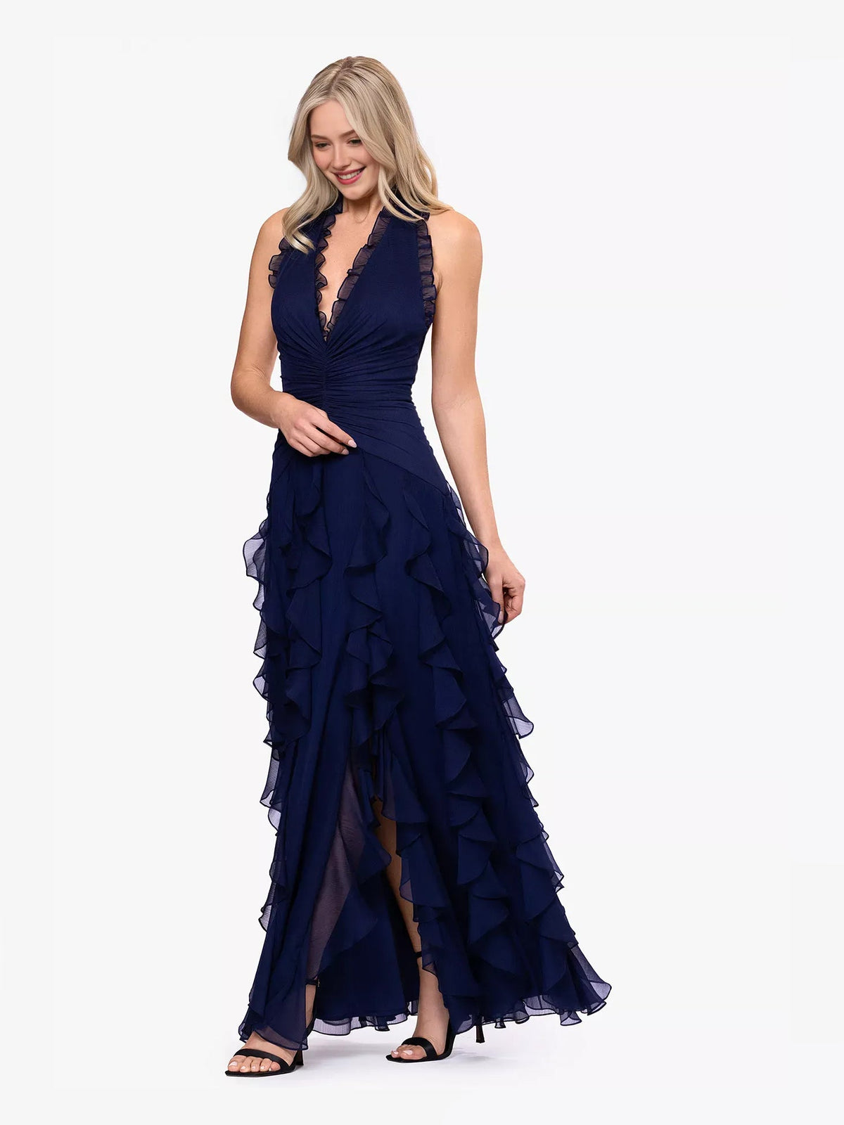 Navy halter neck tiered gown with cascading ruffles and front slit