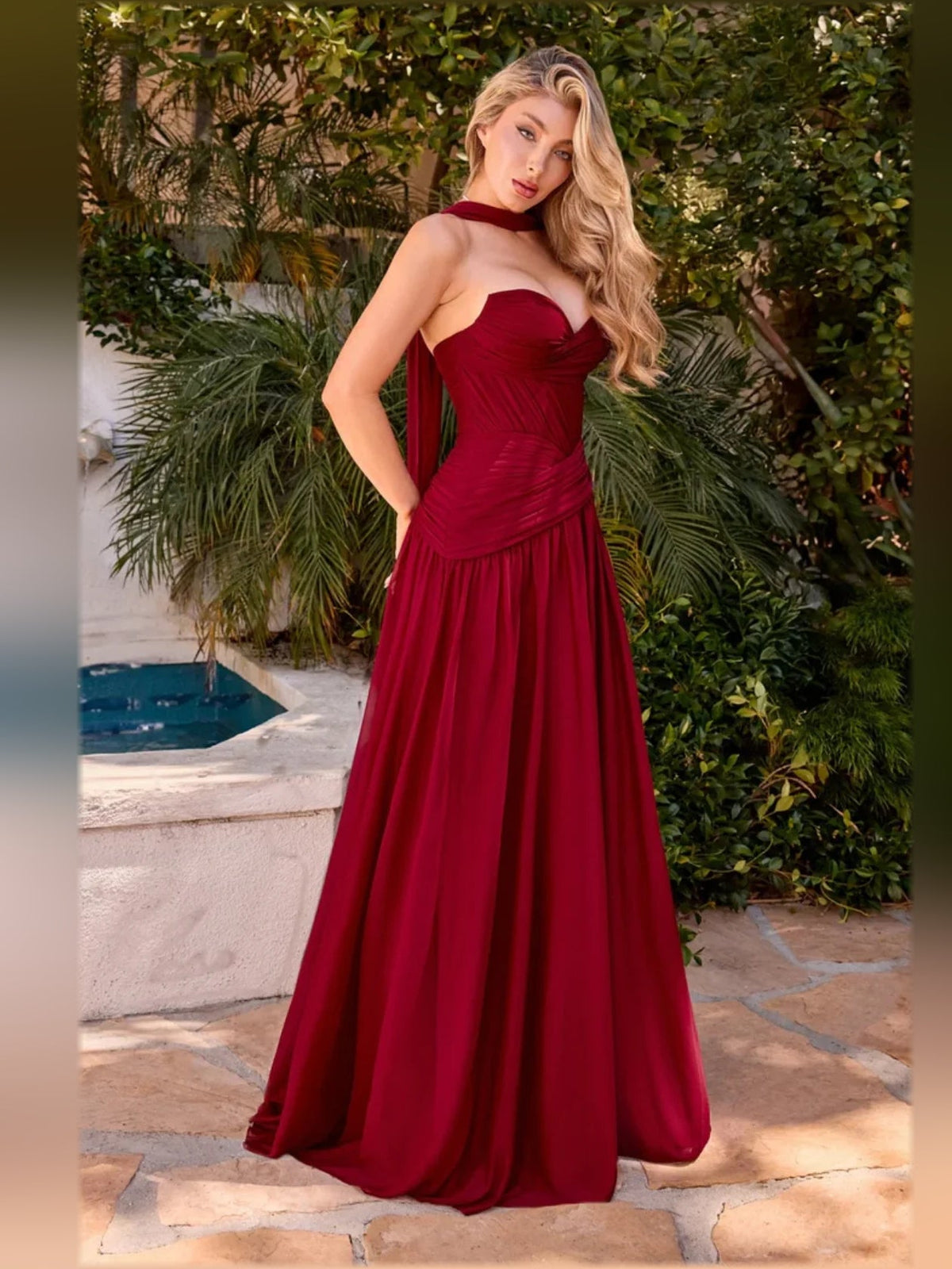 Burgundy halter-neck chiffon formal dress with sweetheart neckline, ruched bodice, and draped sash