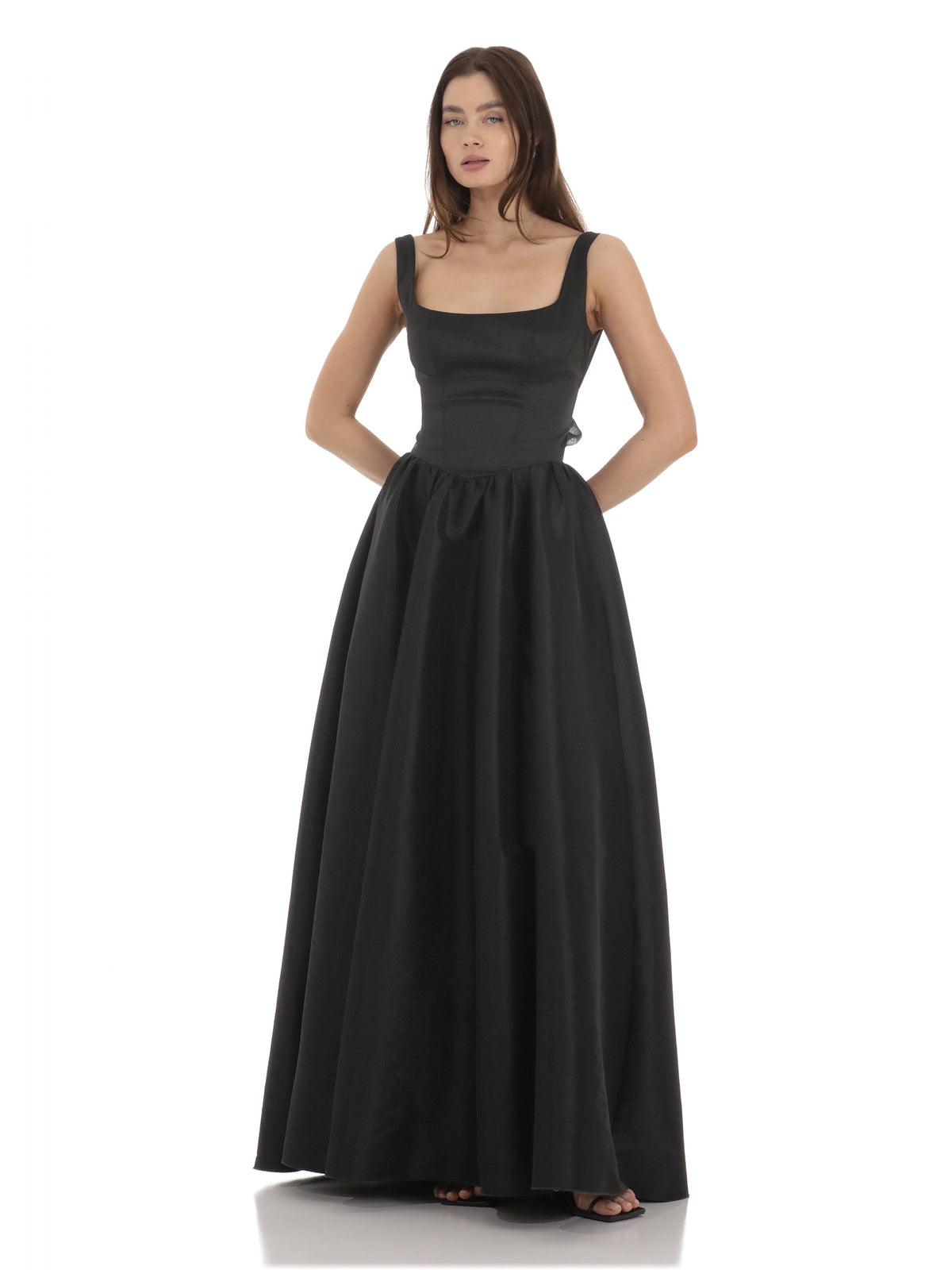 Black bridesmaid dress with structured woven fabric construction and floor-length hem
