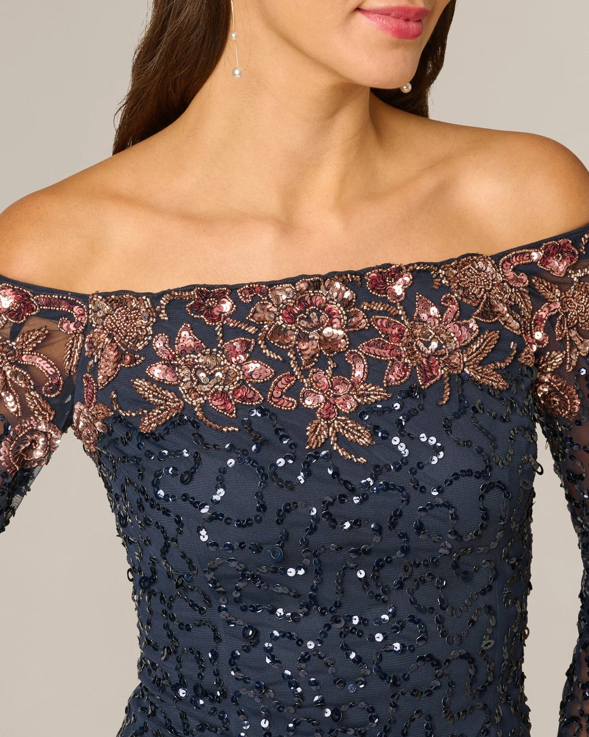 Navy off-shoulder bodice with floral lace trim and rose-gold toned sequins