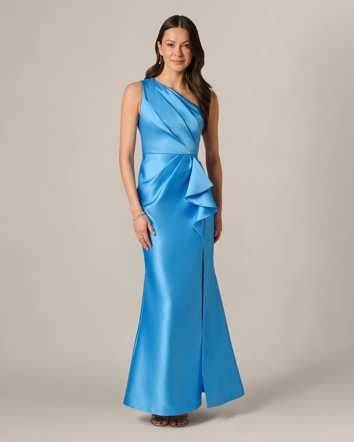 Sky blue one-shoulder maxi gown with diagonal drape and asymmetrical ruffle