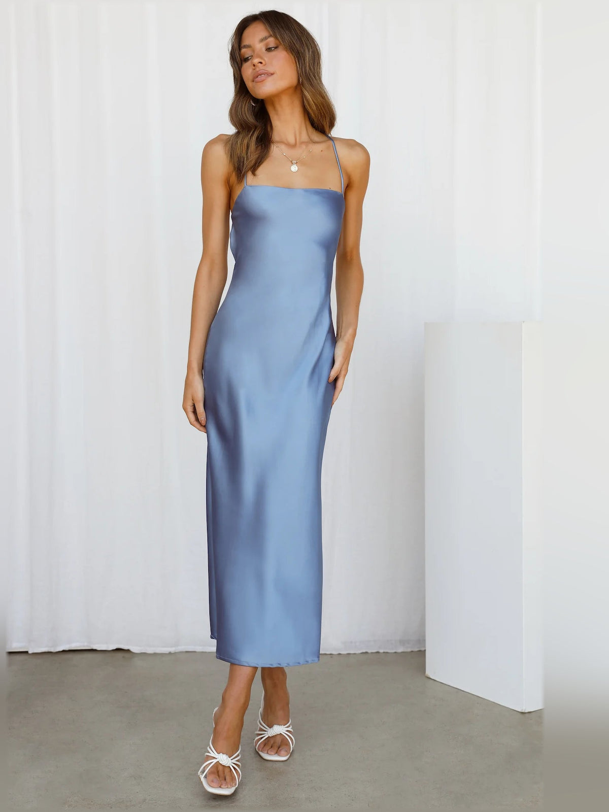 Blue satin midi formal dress with spaghetti straps and column silhouette
