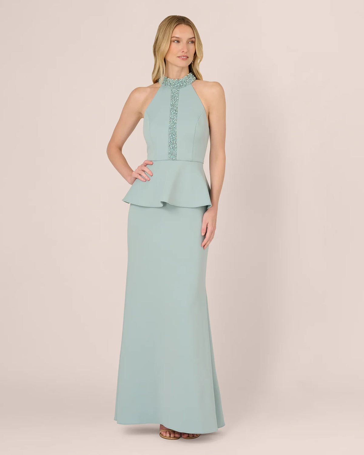 Mint halter neck A-line maxi dress with beaded keyhole detail and peplum waist.