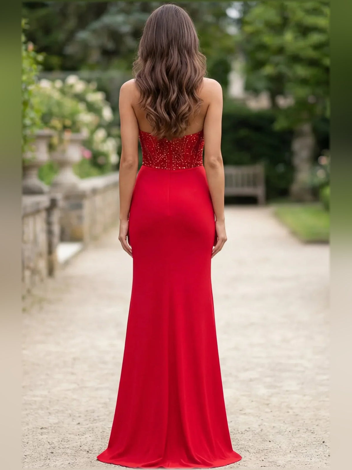Red sweetheart corset evening gown from back view, lace bodice with ruched waist