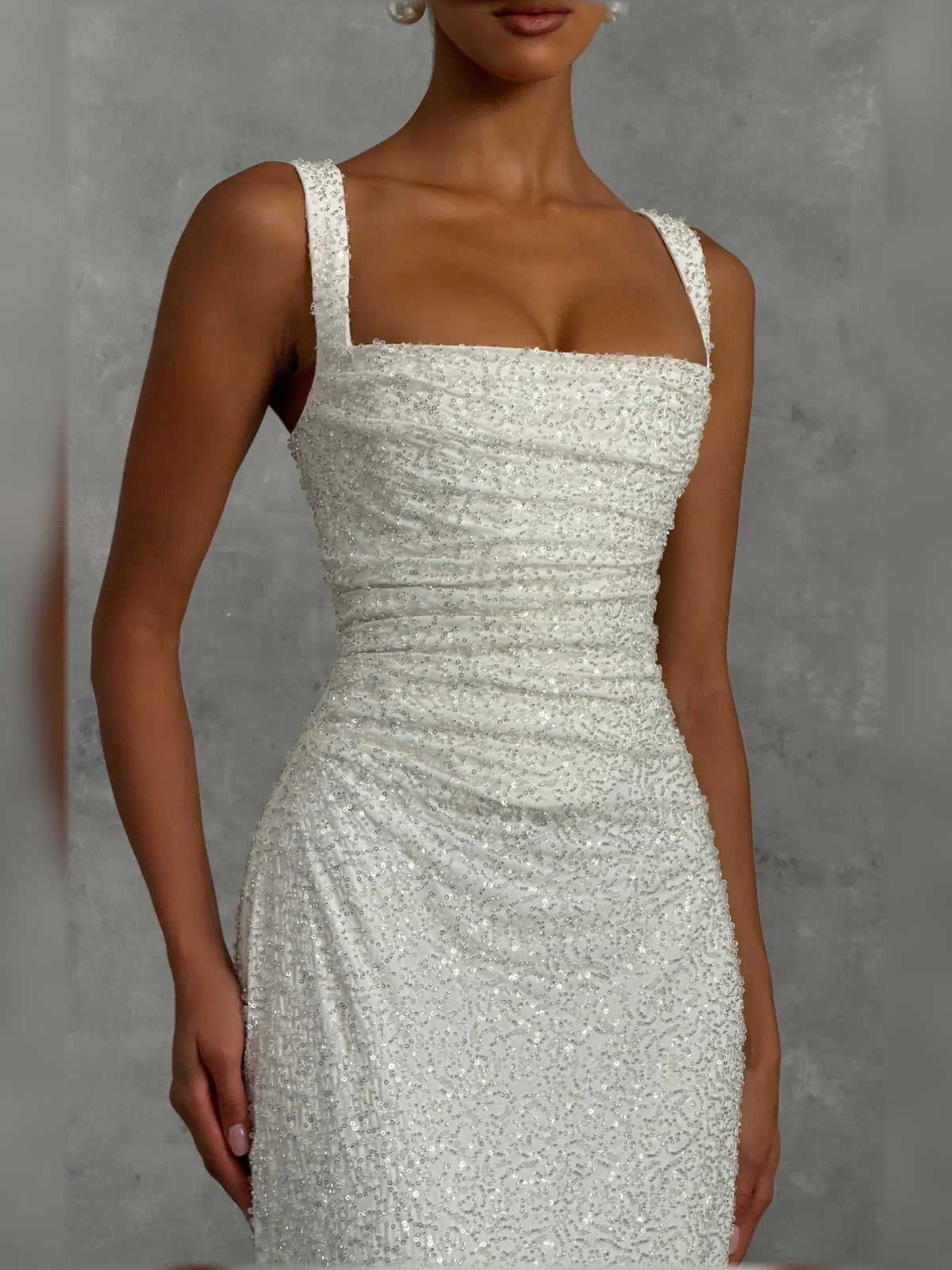 Ivory square-neck corset formal dress with ruched bodice and sequined floor-length skirt