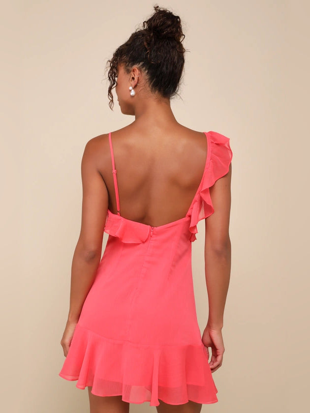 Coral pink backless mini dress with ruffled straps and tiered skirt hem