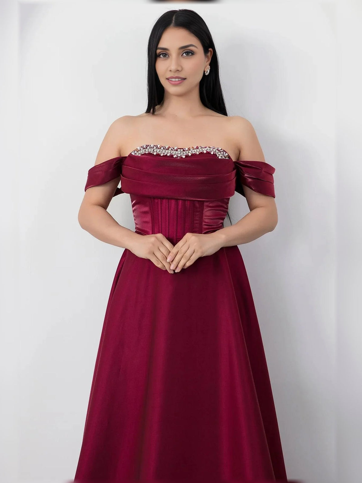 Deep red off-shoulder corset formal dress with beaded trim and satin skirt