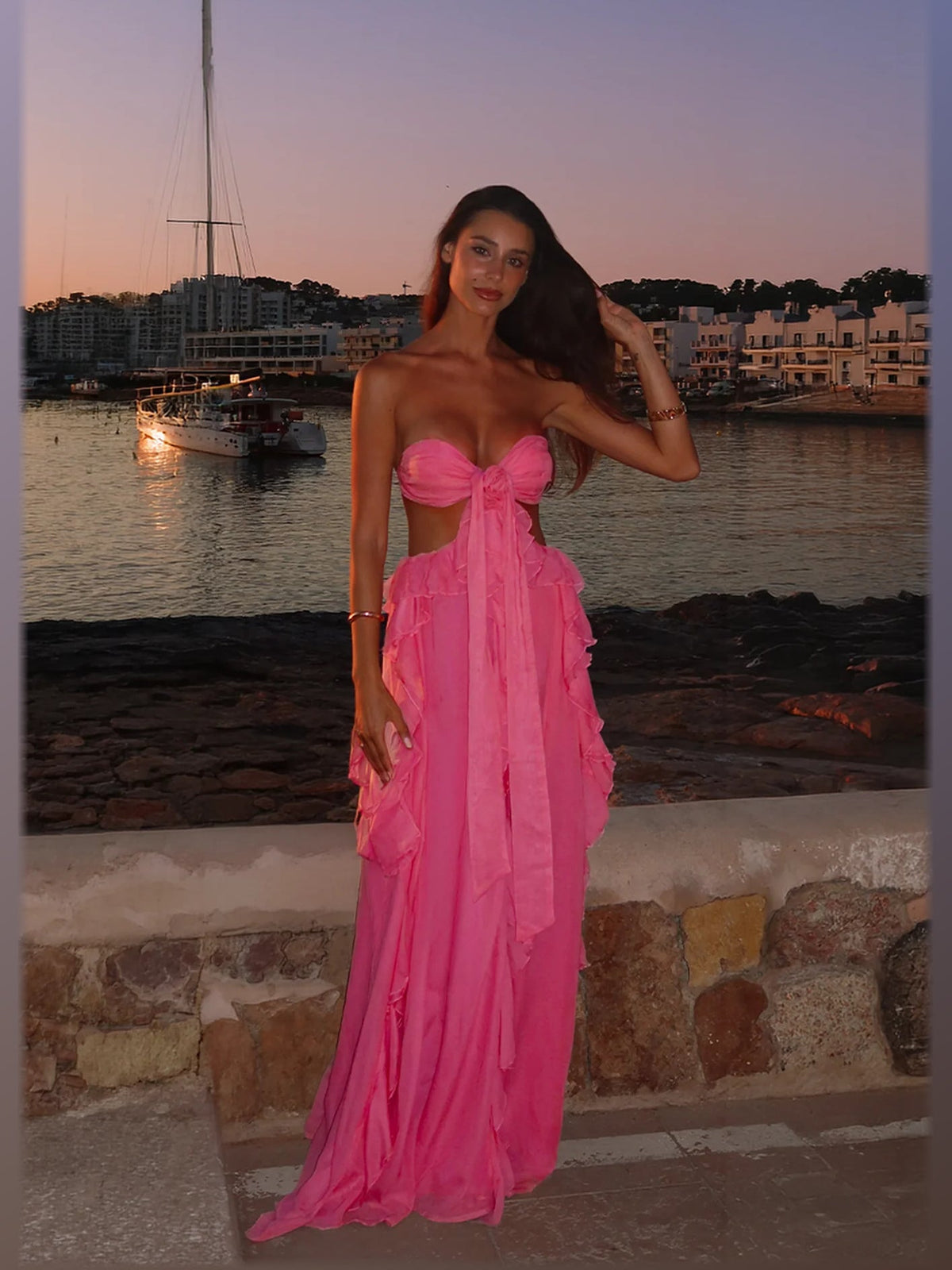 Fuchsia formal dress with structured woven fabric construction and maxi hem