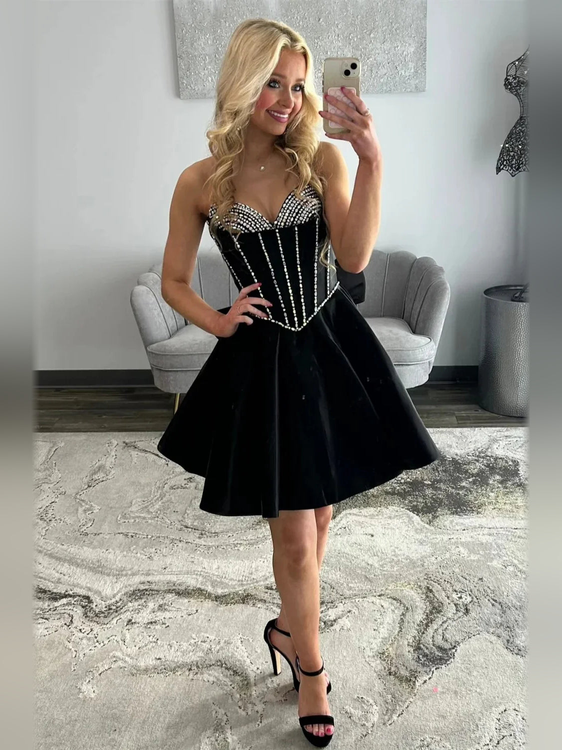 Black sweetheart corset A-line satin dress with sparkly neckline and full skirt