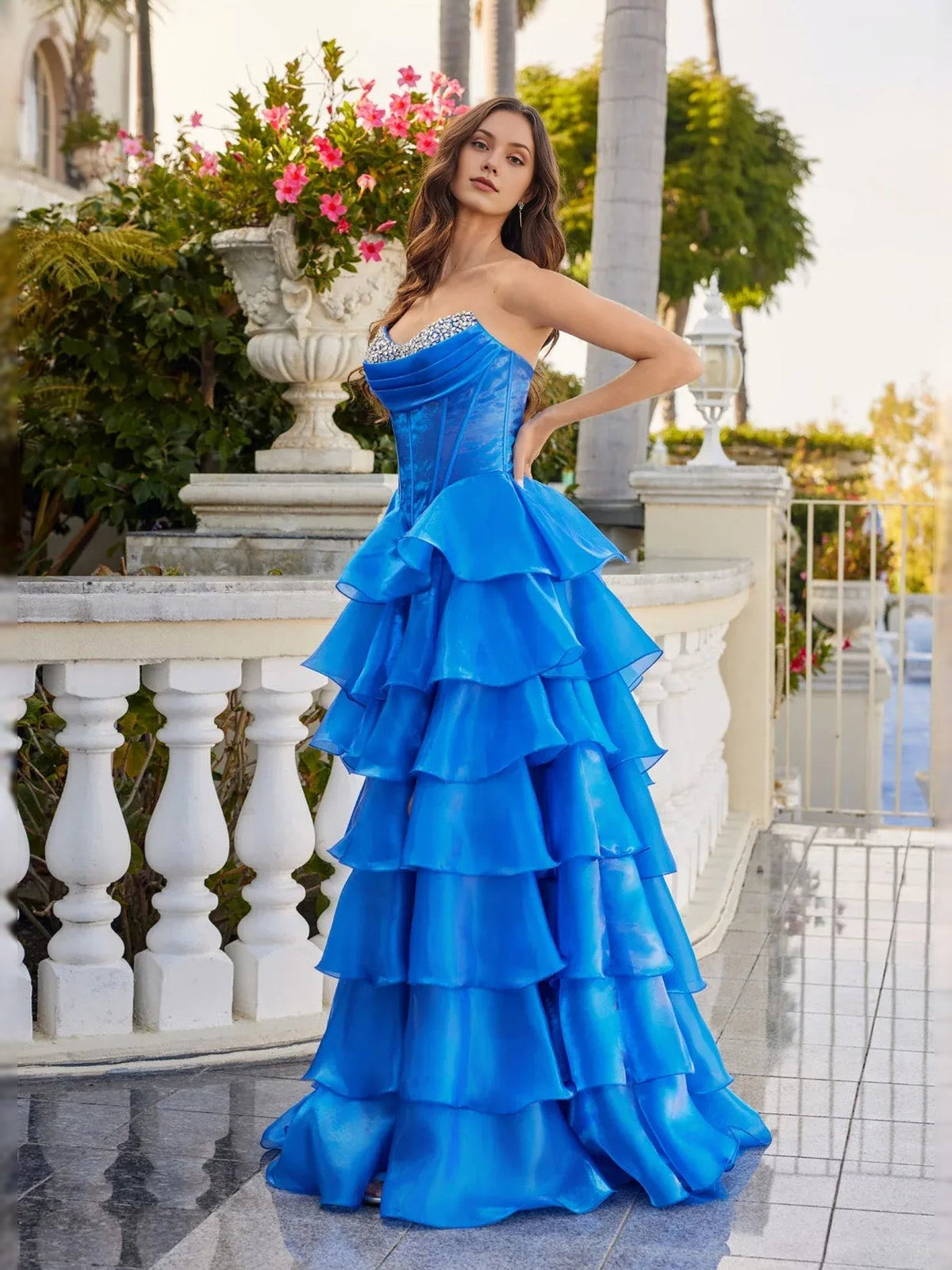 Cobalt blue tiered corset prom gown with sweetheart neckline and side slit